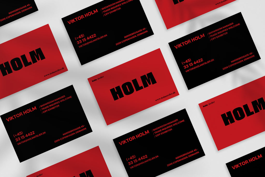 Holm Atelier business card – front and back view – editorial typography 300gsm matte finish