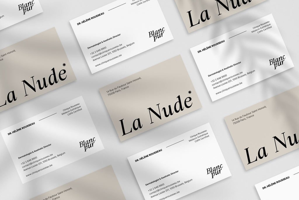 La Nude business card – front and back view – minimalist typography 300gsm matte finish