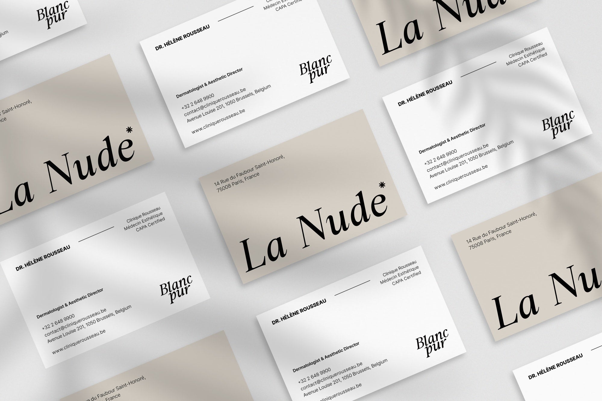 La Nude business card – front and back view – minimalist typography 300gsm matte finish
