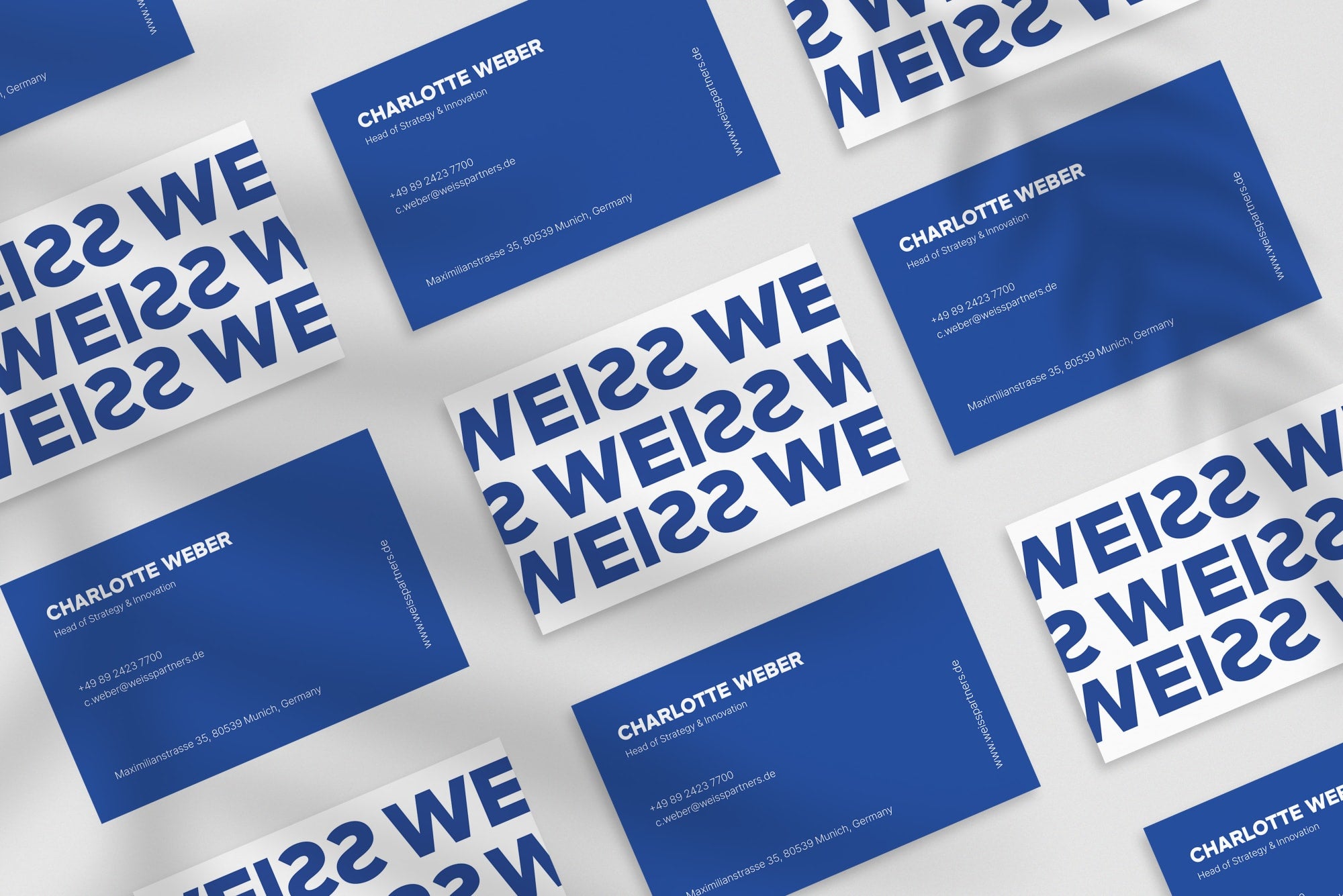 Weiss Partners business card – front and back view – sharp typography 300gsm matte finish