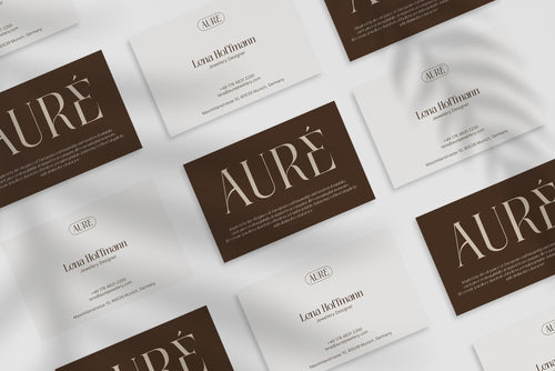 Aure Jewellery business card – front and back view – refined typography 300gsm matte finish